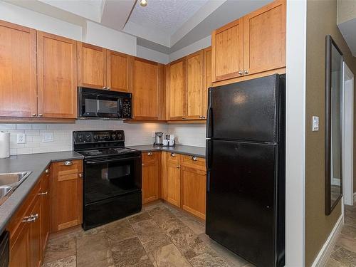 310 A&C-1376 Lynburne Pl, Langford, BC - Indoor Photo Showing Kitchen With Double Sink