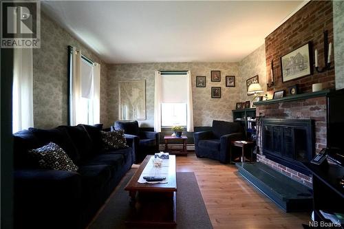 50 Hannah Road, Dufferin, NB - Indoor Photo Showing Living Room With Fireplace
