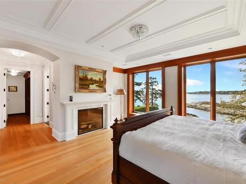 2871 Sea View Rd, Saanich, BC - Indoor Photo Showing Bedroom With Fireplace