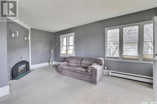 2774 Wallace Street, Regina, SK - Indoor Photo Showing Living Room With Fireplace