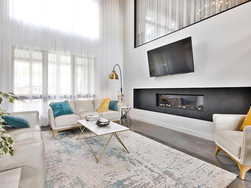 Salon - 3871 Rue Dugué, Longueuil (Saint-Hubert), QC - Indoor Photo Showing Living Room With Fireplace
