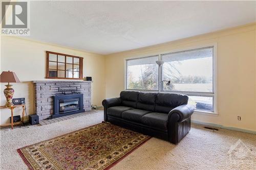 2157 River Road, Kemptville, ON - Indoor Photo Showing Living Room With Fireplace