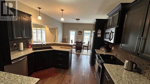 18 Simon Drive, Stephenville, NL - Indoor Photo Showing Kitchen With Double Sink
