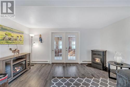 6 Brousseau Road, Alban, ON - Indoor Photo Showing Living Room With Fireplace