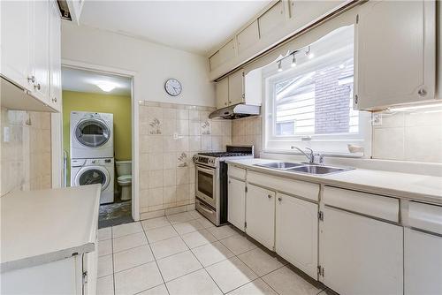 83 Graham Avenue S, Hamilton, ON - Indoor Photo Showing Kitchen With Double Sink