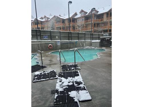 109 - 400 Stemwinder Drive, Kimberley, BC - Outdoor With In Ground Pool