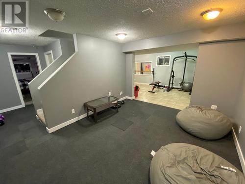 10701 Cyprus Court, Dawson Creek, BC - Indoor Photo Showing Gym Room