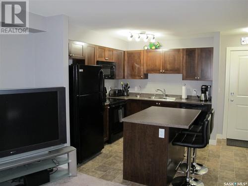 407 306 Petterson Drive, Estevan, SK - Indoor Photo Showing Kitchen With Double Sink