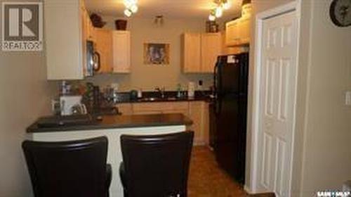 4 201 Carlyle Avenue, Carlyle, SK - Indoor Photo Showing Kitchen