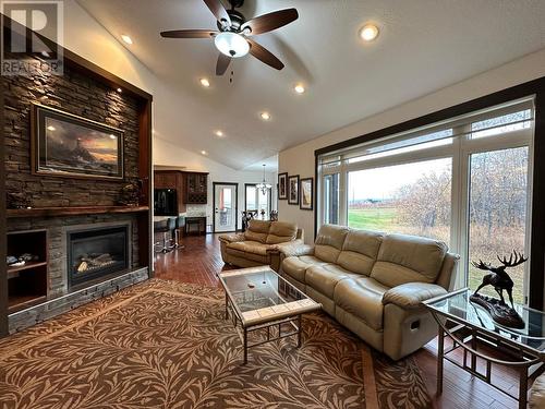 13368 Elk Ridge Trail, Dawson Creek, BC - Indoor Photo Showing Living Room With Fireplace