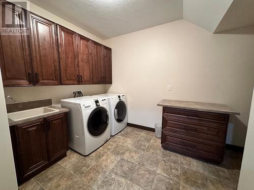 13368 Elk Ridge Trail, Dawson Creek, BC - Indoor Photo Showing Laundry Room