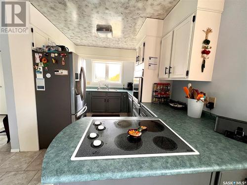 312 1St Avenue, Mervin, SK - Indoor Photo Showing Kitchen With Double Sink