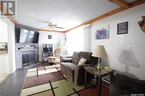 6 Elm Avenue, Moosomin Regional Park, SK - Indoor Photo Showing Living Room With Fireplace