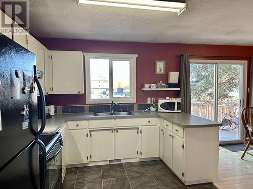 115 Murray Street, Fraser Lake, BC - Indoor Photo Showing Kitchen With Double Sink