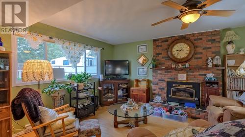 10713 Julia Street, Summerland, BC - Indoor Photo Showing Living Room With Fireplace