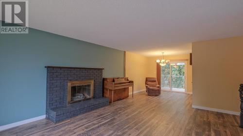 10713 Julia Street, Summerland, BC - Indoor Photo Showing Living Room With Fireplace