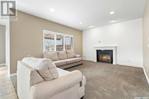 619 Brookhurst Court, Saskatoon, SK - Indoor Photo Showing Living Room With Fireplace