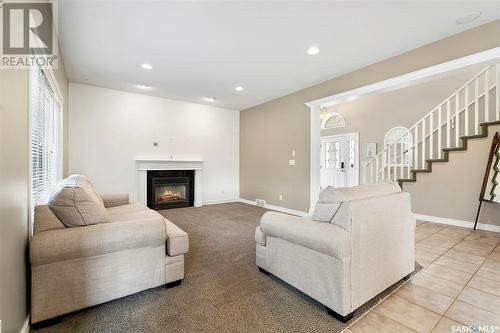 619 Brookhurst Court, Saskatoon, SK - Indoor Photo Showing Living Room With Fireplace