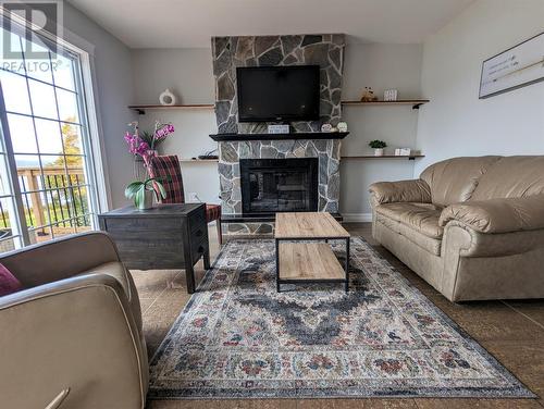 31 Tipping Drive, Pasadena, NL - Indoor Photo Showing Living Room With Fireplace