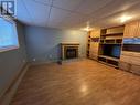 5207 Sunset Drive, Fort Nelson, BC  - Indoor With Fireplace 