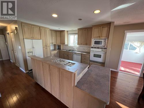 5207 Sunset Drive, Fort Nelson, BC - Indoor Photo Showing Kitchen With Double Sink