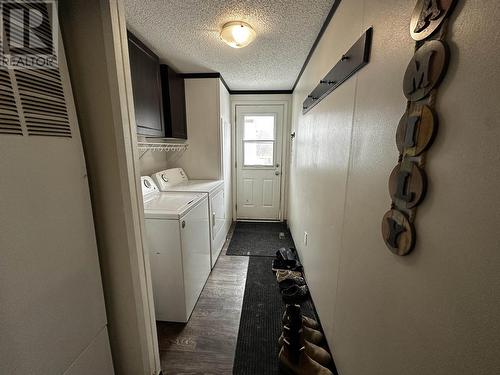 6812 Old Alaska Highway, Fort Nelson, BC - Indoor Photo Showing Laundry Room