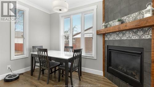 3222 Peter Street, Windsor, ON - Indoor Photo Showing Dining Room With Fireplace