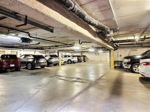 Parking - 101-260 Rue Radisson, Saint-Jérôme, QC - Indoor Photo Showing Garage