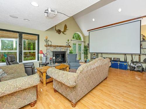 2726 Otter Point Rd, Sooke, BC - Indoor Photo Showing Living Room With Fireplace