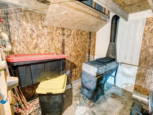 Garage - 1119 Petit Rang, Sainte-Clotilde-De-Horton, QC - Indoor Photo Showing Other Room With Fireplace