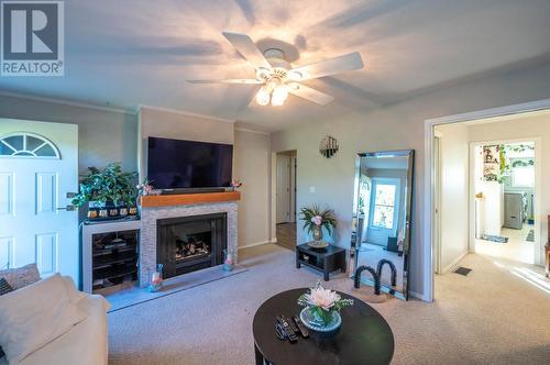 1280 Johnson Road, Penticton, BC - Indoor Photo Showing Living Room With Fireplace