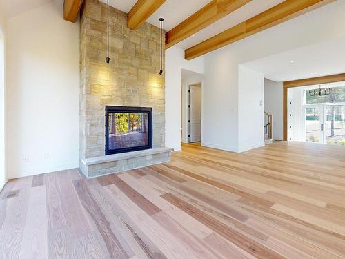Salon - 1500 Ch. De L'Armoise, Piedmont, QC - Indoor Photo Showing Living Room With Fireplace