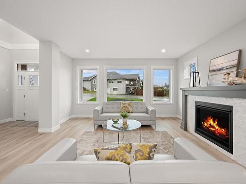 4010 Southwalk Dr, Courtenay, BC - Indoor Photo Showing Living Room With Fireplace