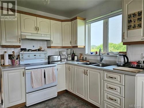 31 Ocean Avenue, Belledune, NB - Indoor Photo Showing Kitchen With Double Sink