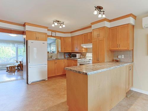 Kitchen - 2485 Boul. Des Mille-Îles, Laval (Saint-François), QC - Indoor Photo Showing Kitchen