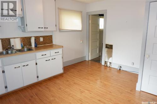 206 7Th Avenue W, Assiniboia, SK - Indoor Photo Showing Kitchen With Double Sink