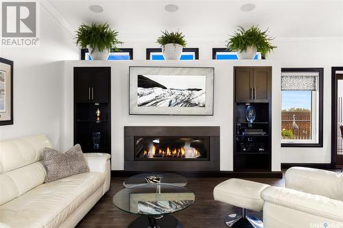 Hanson Acreage - Hwy #13, Stoughton, SK - Indoor Photo Showing Living Room With Fireplace