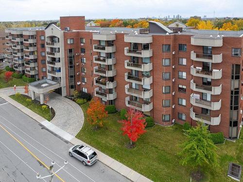 Photo aÃ©rienne - 501-450 Rue St-Georges, Saint-Lambert, QC - Outdoor With Balcony With Facade