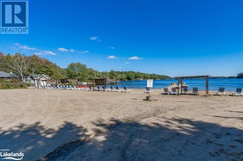 Beach - 1869 Muskoka Road 118 Highway W Unit# B102- A1, Muskoka Lakes, ON - Outdoor With Body Of Water With View