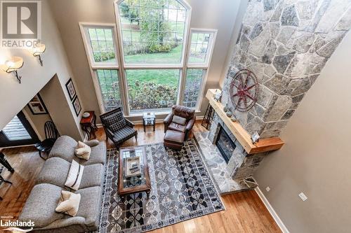 3876 Muskoka 118 Road W Unit# Carling 6-W5, Port Carling, ON - Indoor With Fireplace
