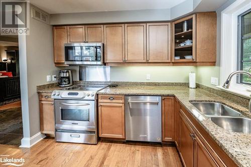 3876 Muskoka 118 Road W Unit# Carling 6-W5, Port Carling, ON - Indoor Photo Showing Kitchen With Double Sink