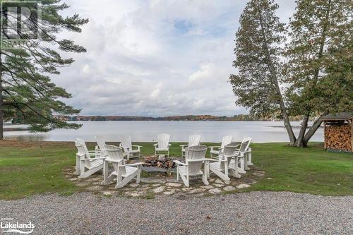 Firepit - 3876 Muskoka 118 Road W Unit# Carling 6-W5, Port Carling, ON - Outdoor With Body Of Water With View