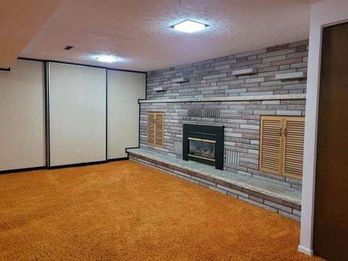 283 Pitt Avenue, Dryden, ON - Indoor With Fireplace