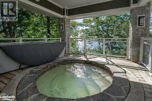 Hot tub at Main Lodge - 1869 Muskoka Road 118 Highway W Unit# A104-C1, Muskoka Lakes, ON - Outdoor