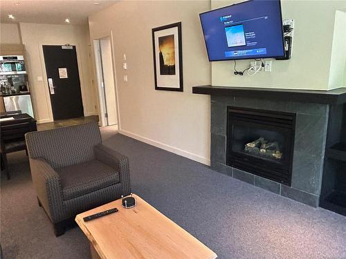 222-596 Marine Dr, Ucluelet, BC - Indoor Photo Showing Living Room With Fireplace