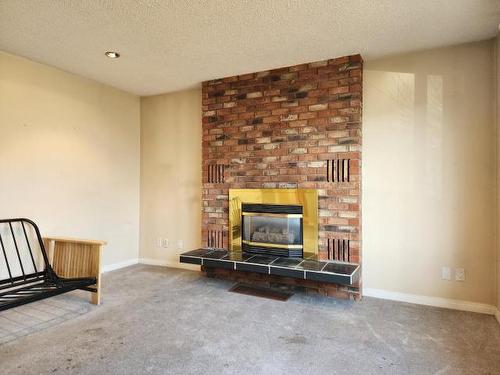 1592 Cumming Blvd, Cache Creek, BC - Indoor Photo Showing Living Room With Fireplace