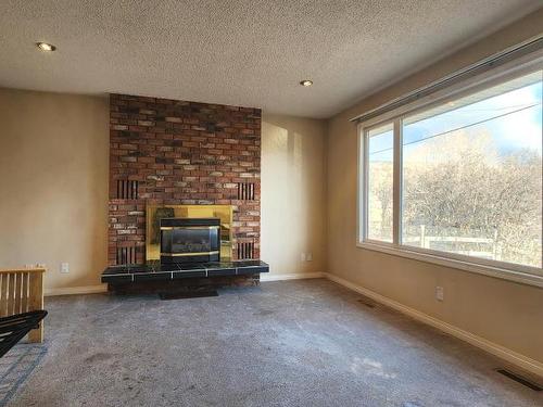 1592 Cumming Blvd, Cache Creek, BC - Indoor Photo Showing Other Room With Fireplace