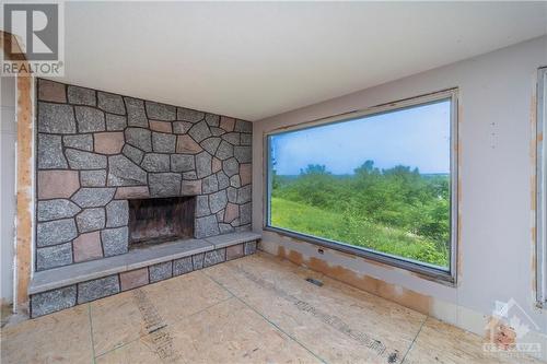 1541 Bella Vista Drive, Cumberland, ON - Indoor With Fireplace