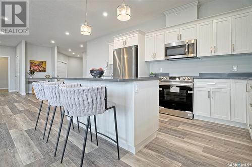 #403 131 Beaudry Crescent, Martensville, SK - Indoor Photo Showing Kitchen With Upgraded Kitchen