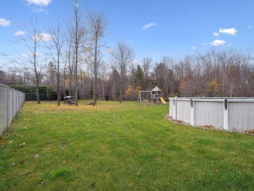 Backyard - 697 Rue Marcelle-Ferron, Saint-Lin/Laurentides, QC - Outdoor With Above Ground Pool With Backyard